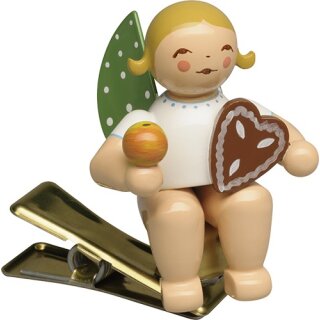 Engel mit Lebkuchen und Apfel auf Klemme